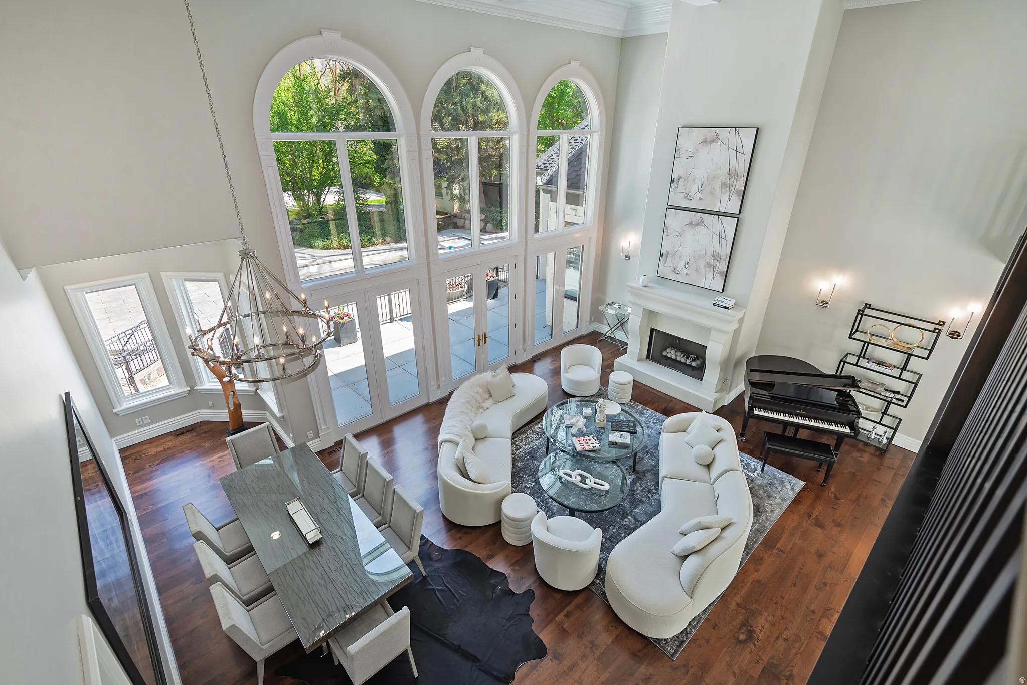 2 story overlook of grand salon, dining room and triple palladium windows