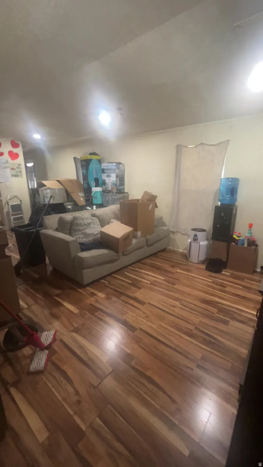 Living area with wood finished floors