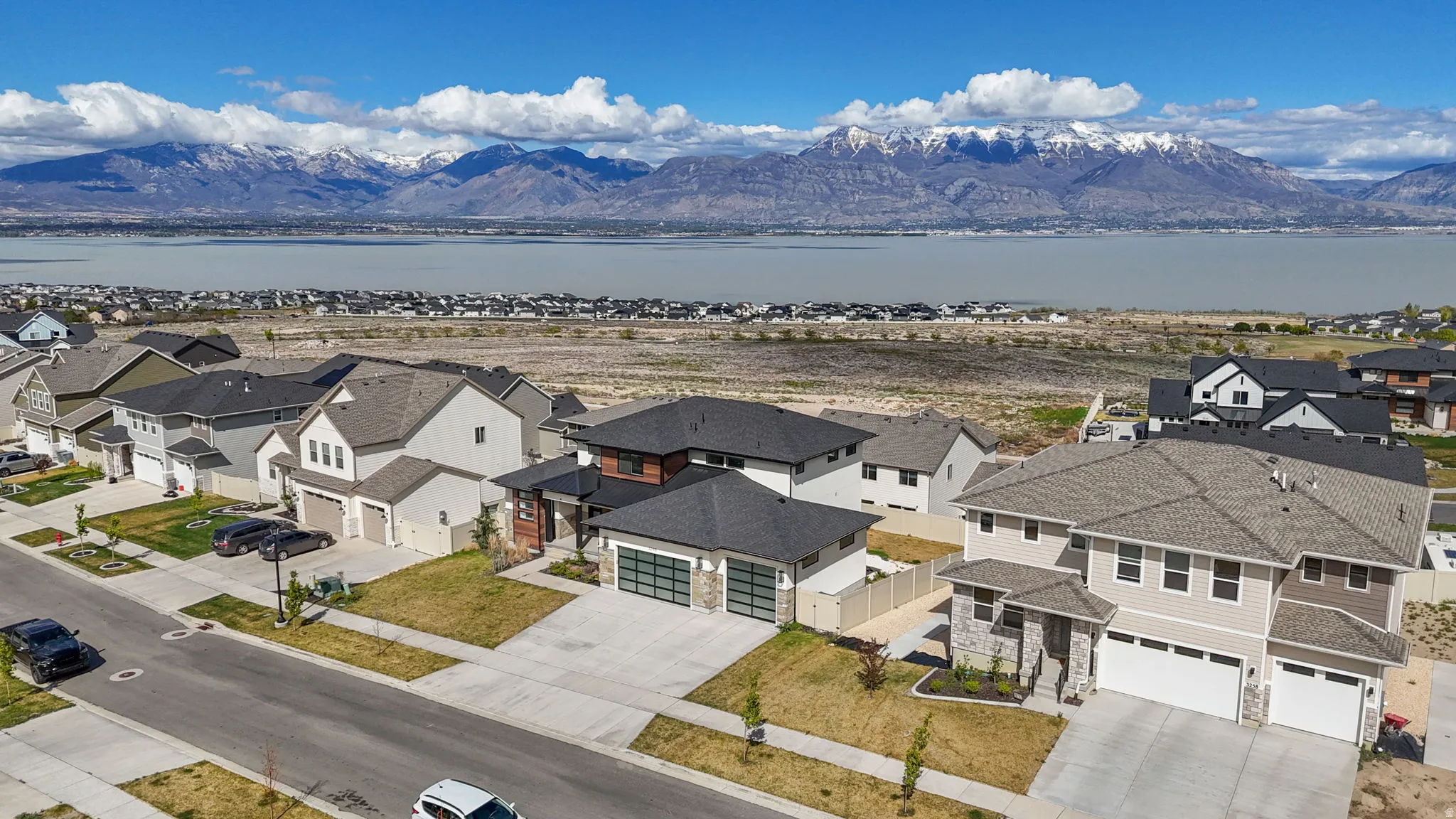 Aerial view of residential area with a water and mountain view