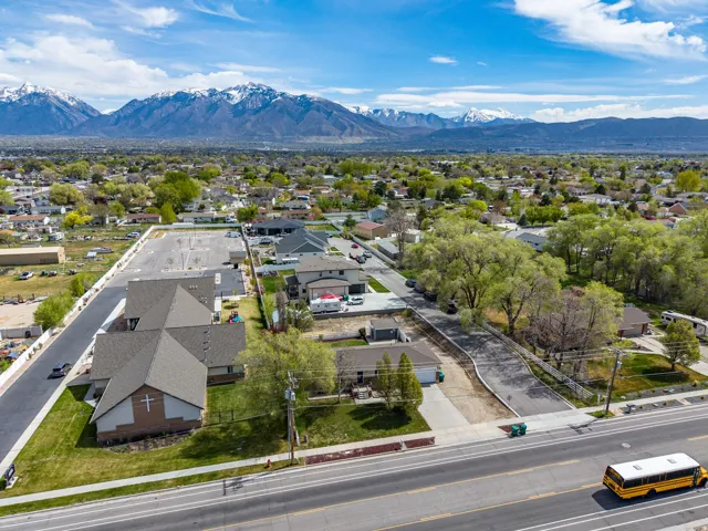 Aerial view of residential area featuring mountains