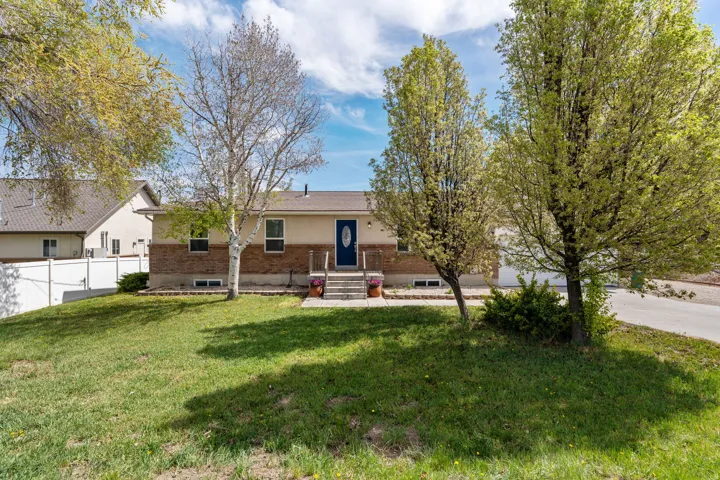 View of front of property featuring brick siding