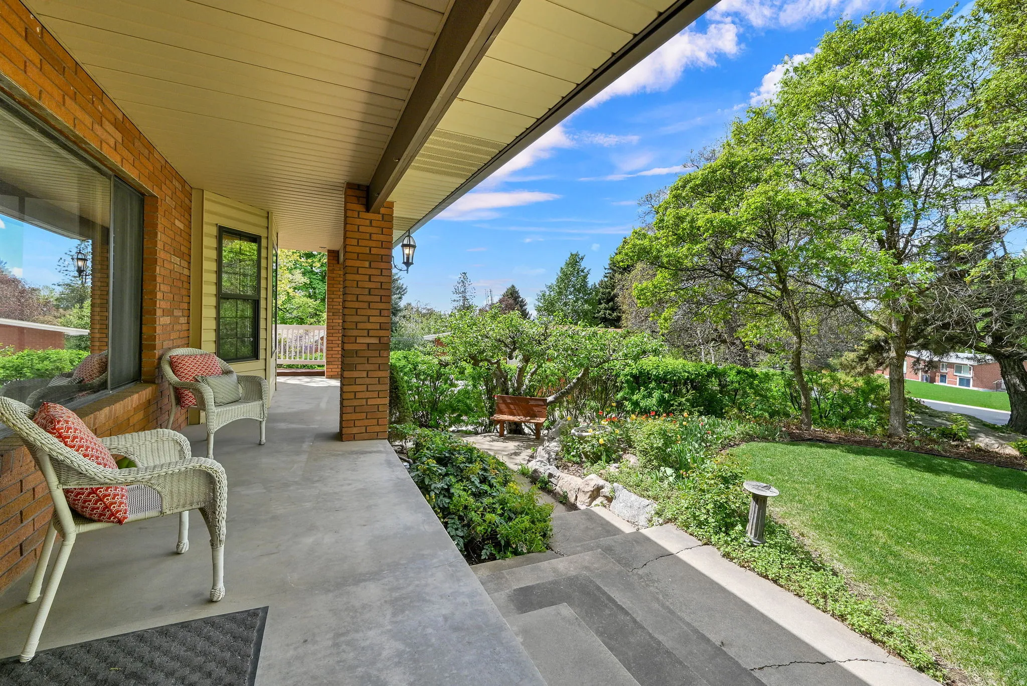 Covered porch with a yard