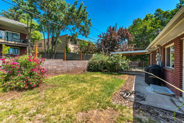 Fenced backyard featuring a patio area