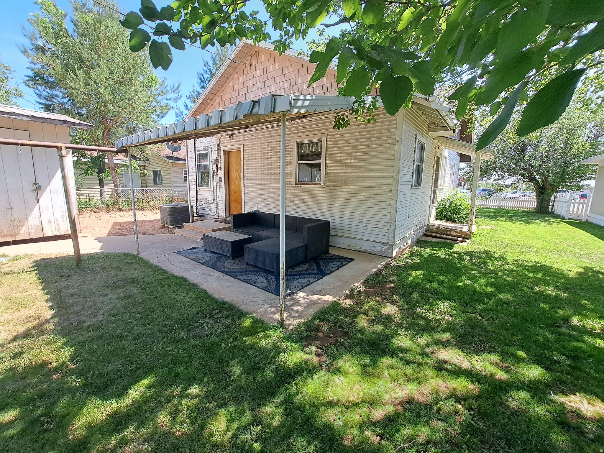 Back of property with a patio area
