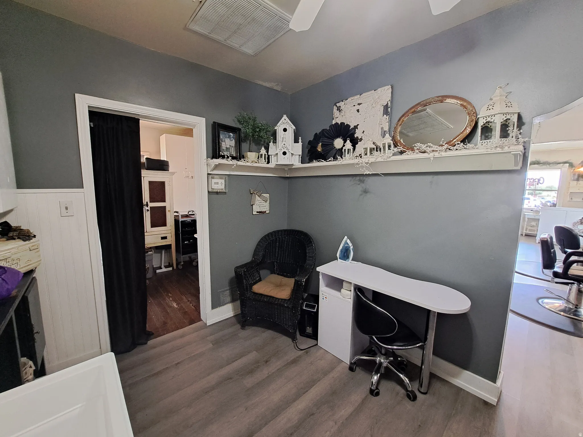 Office area featuring wood finished floors