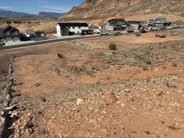 View of mountain backdrop with nearby suburban area