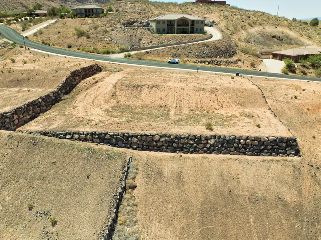 Terraced lot featuring stone retaining walls