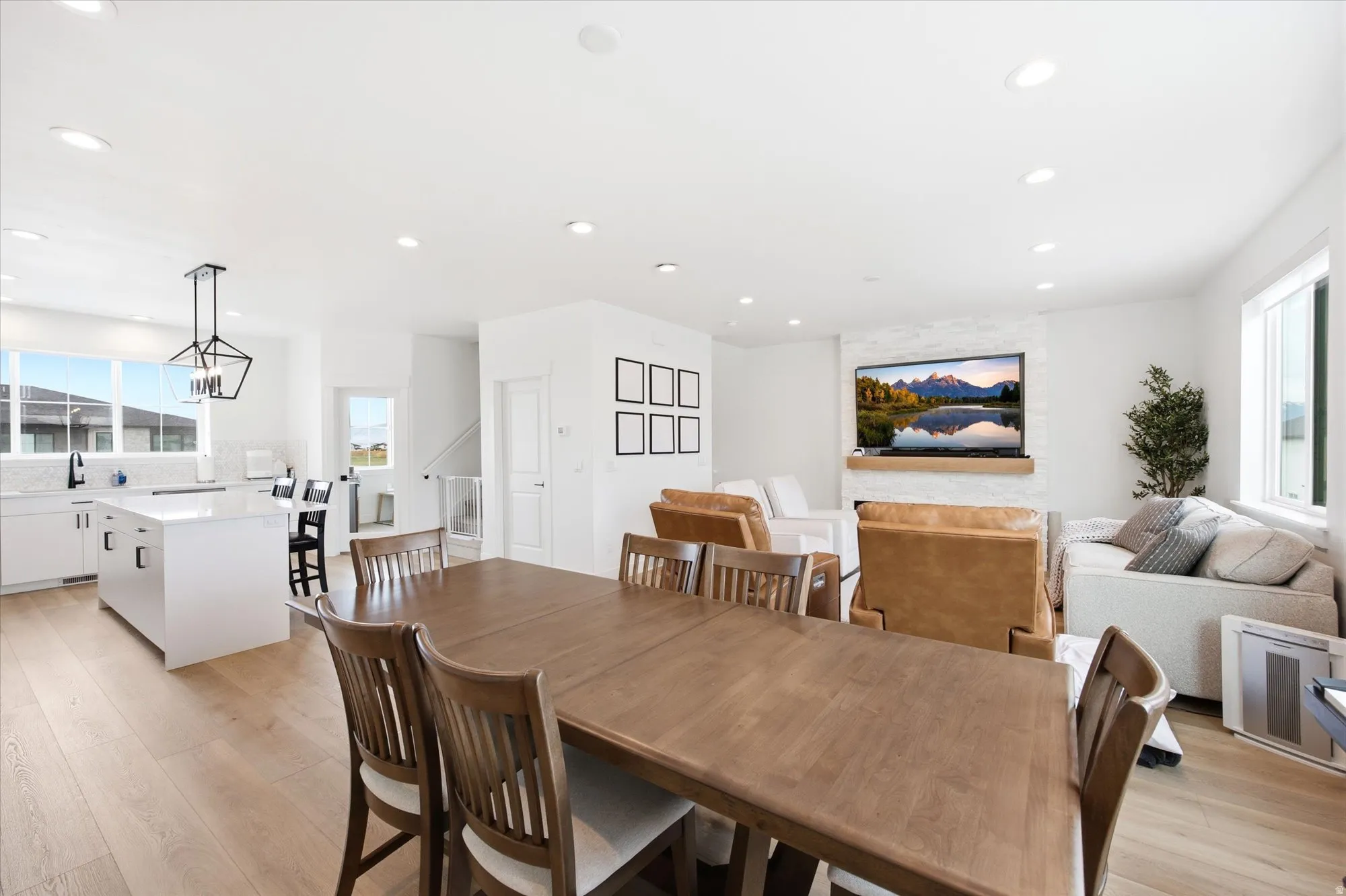 Dining room featuring light wood finished floors and recessed lighting