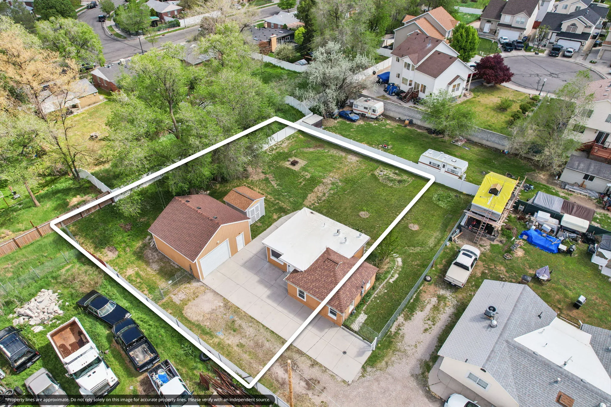 Aerial perspective of suburban area with property parcel outlined