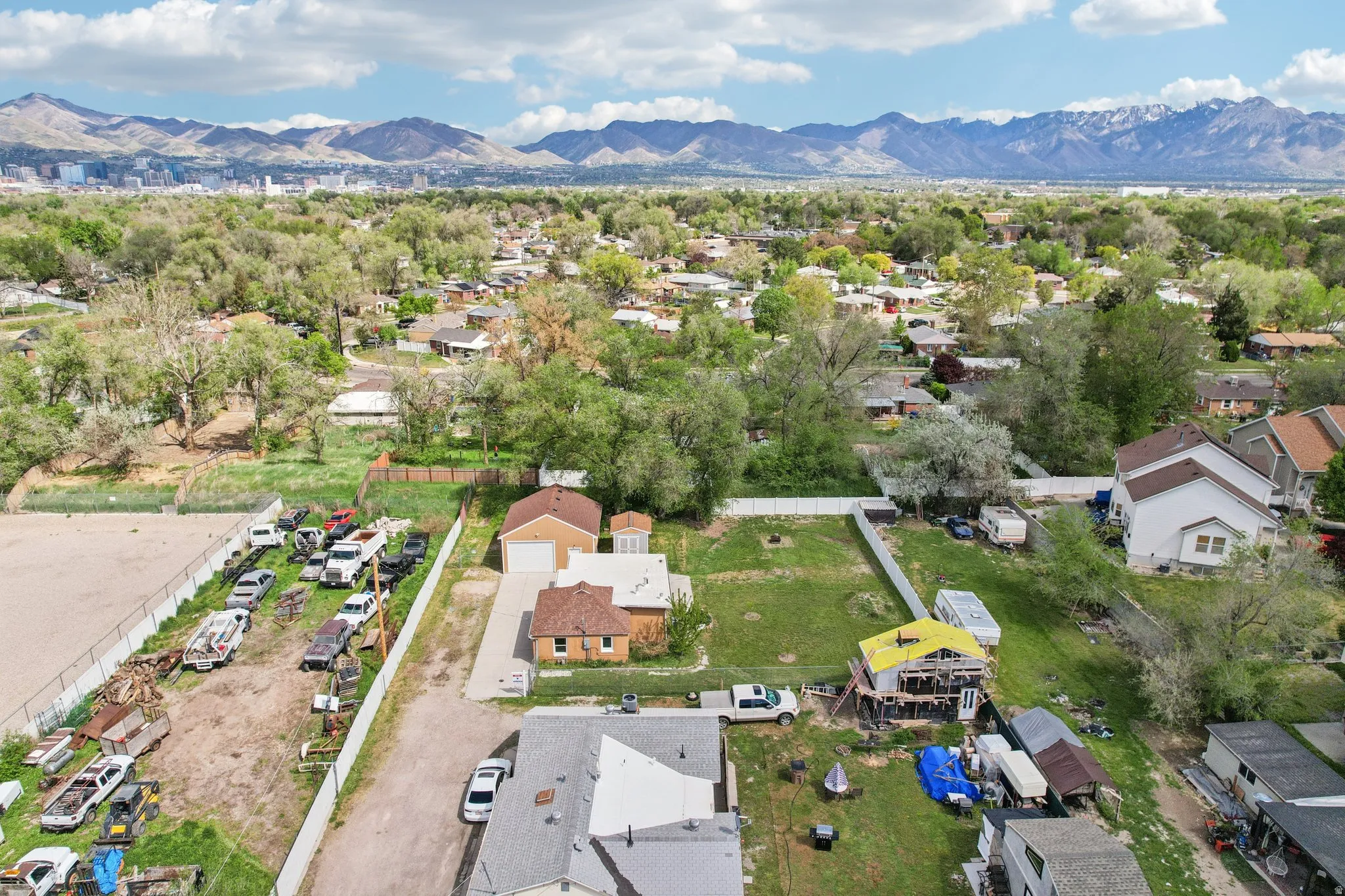 Aerial view of residential area featuring mountains