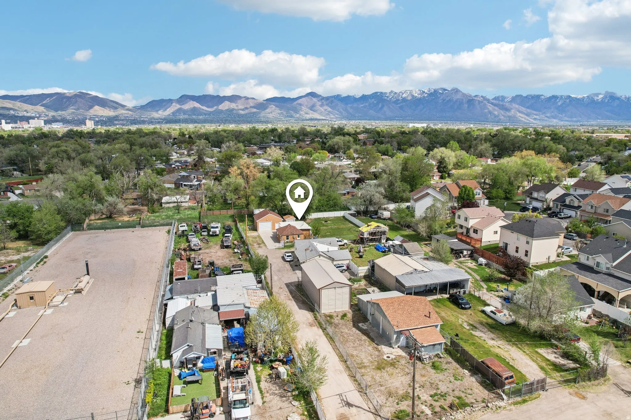 Aerial view of residential area featuring mountains