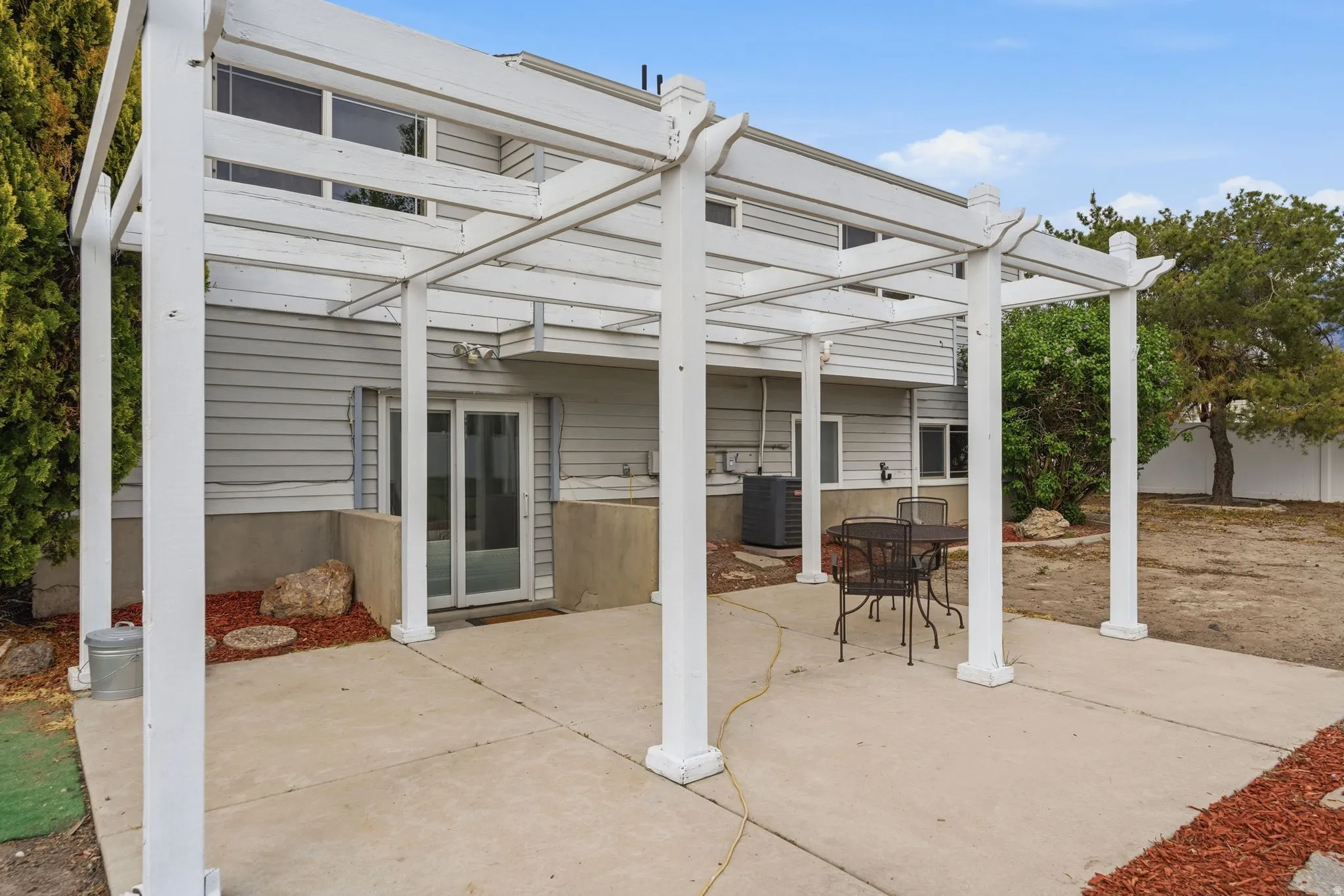 View of patio with a pergola