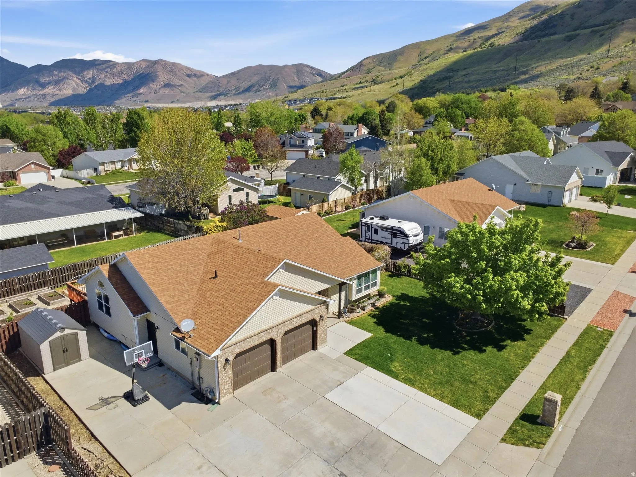 Aerial perspective of suburban area with mountains