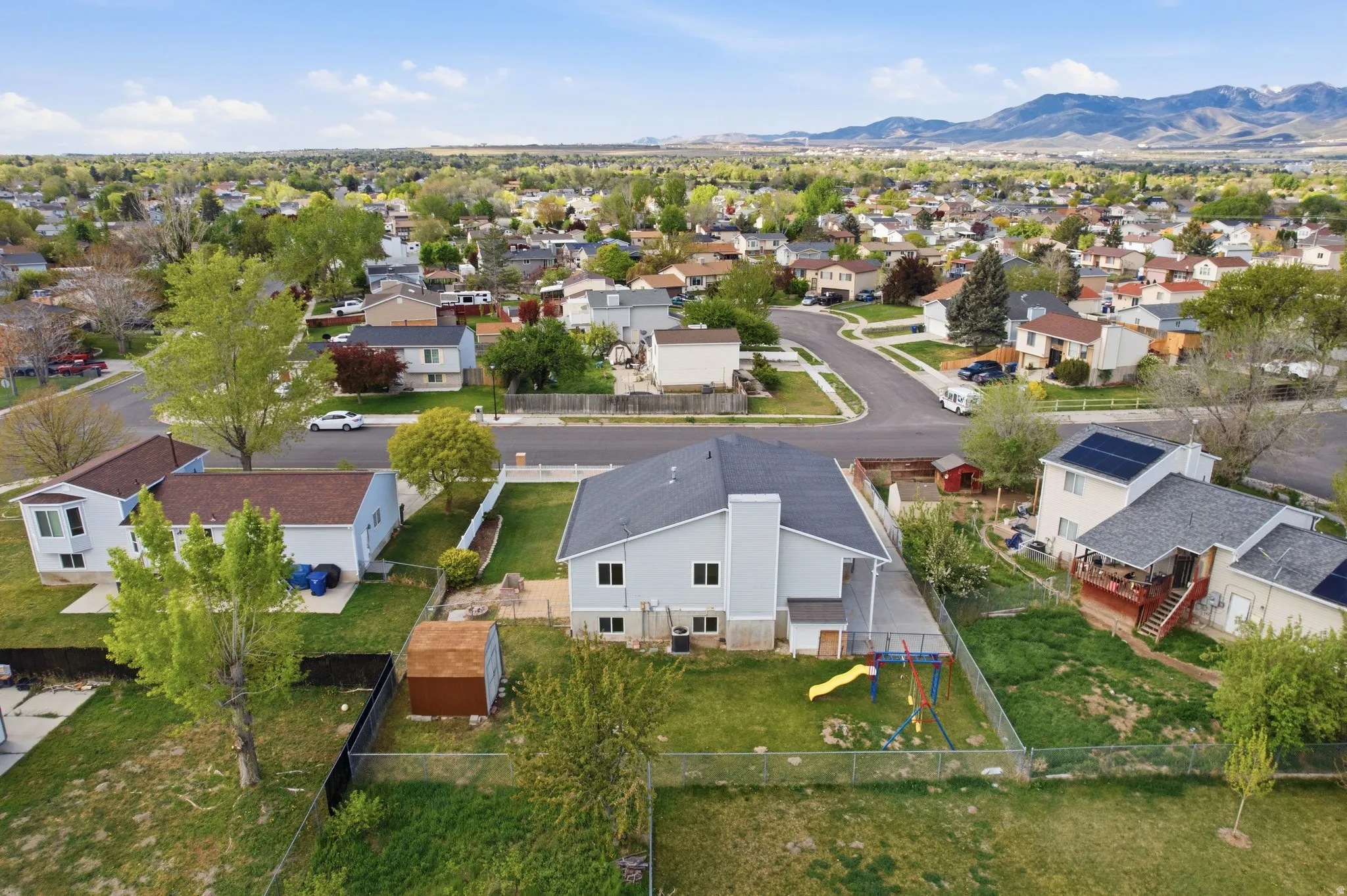 Aerial perspective of suburban area featuring mountains