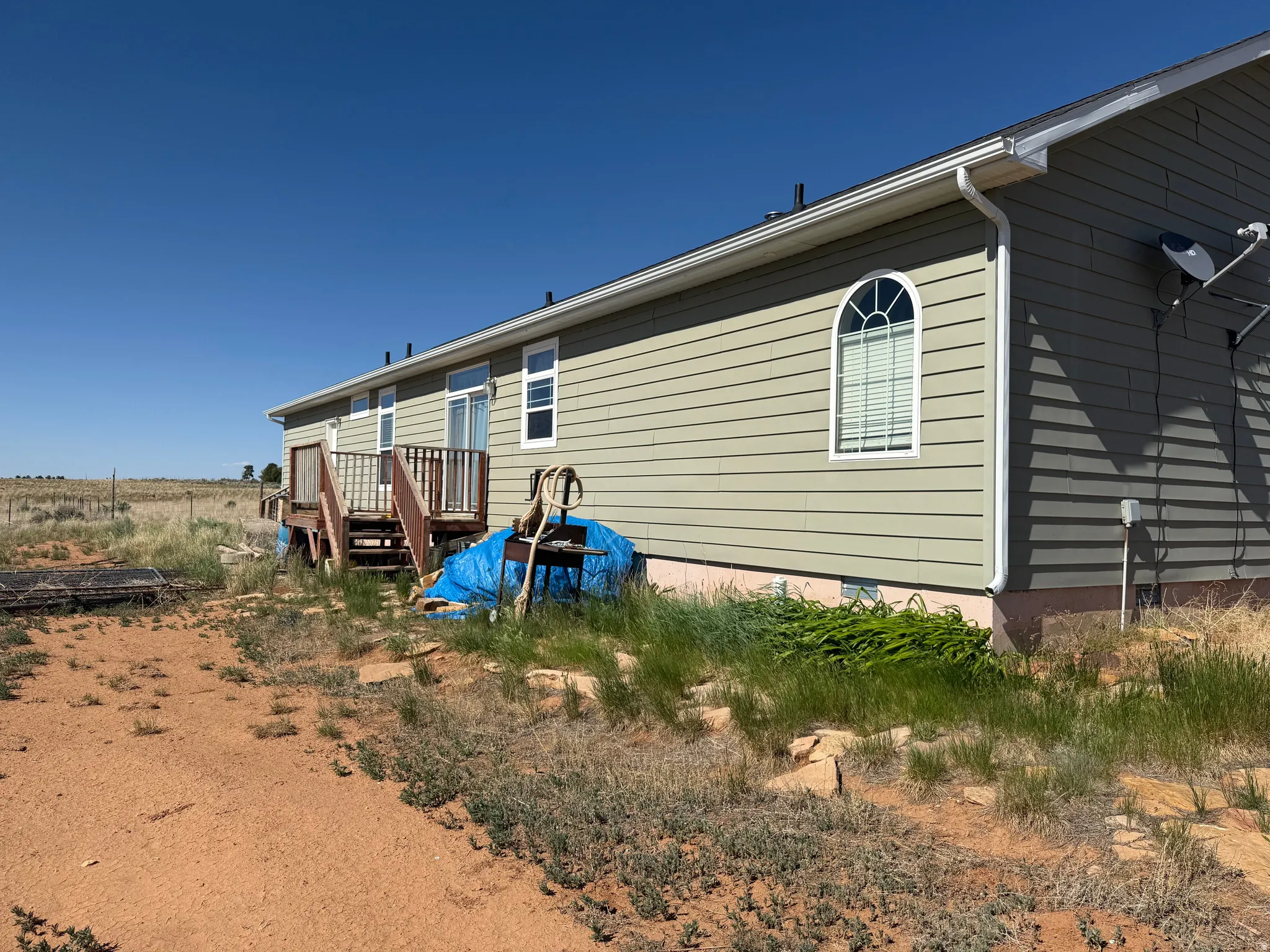 Rear view of property with a deck