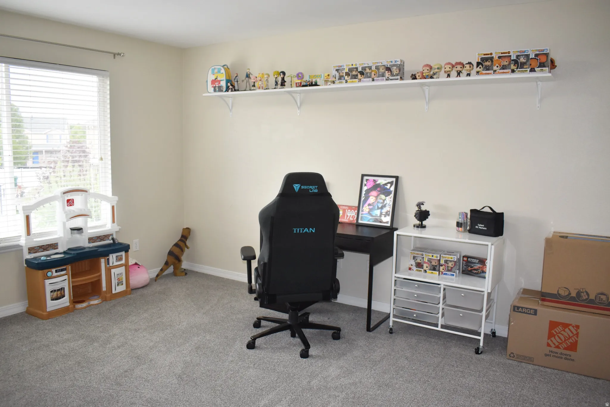 Carpeted home office with baseboards