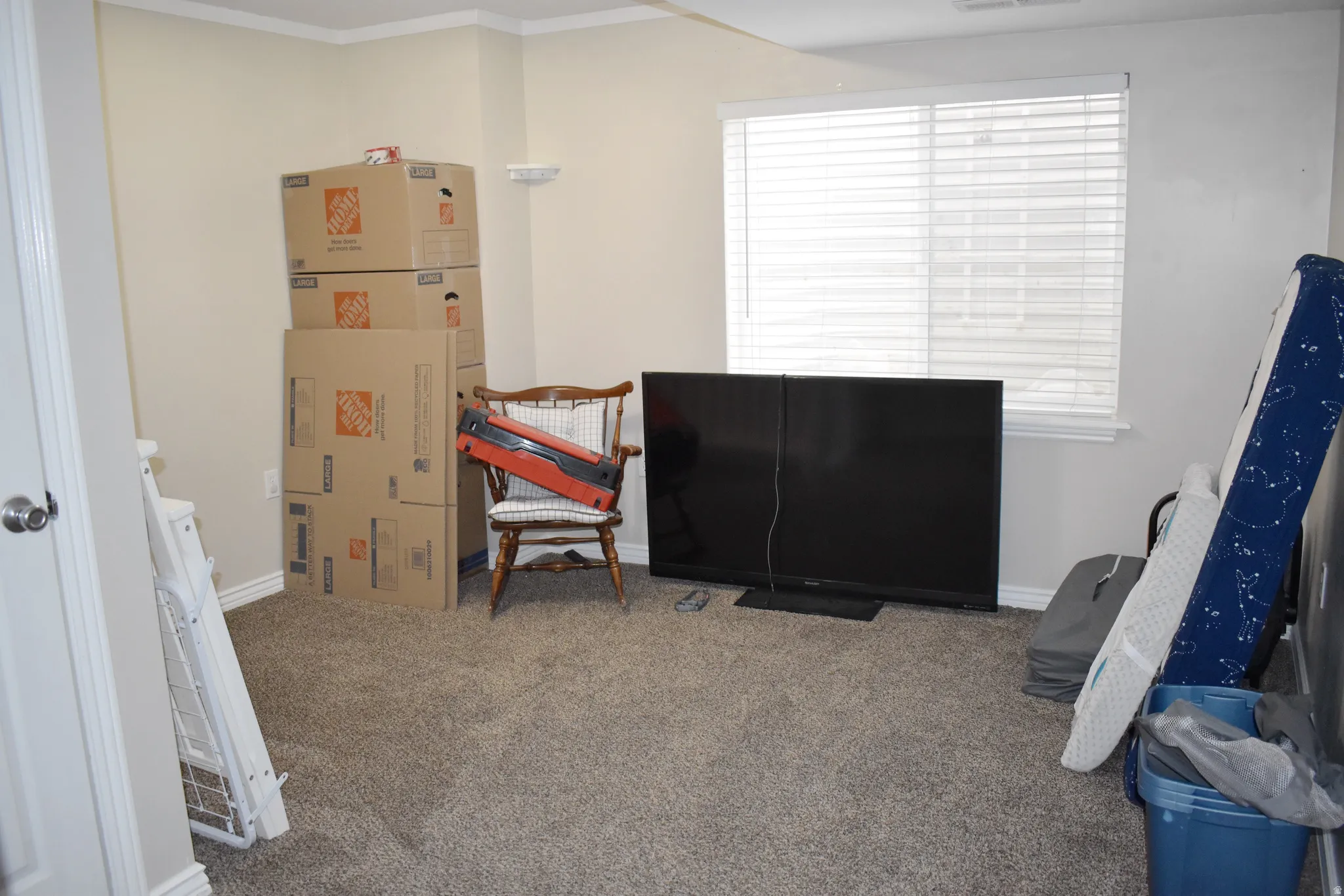 Game room with carpet flooring and baseboards