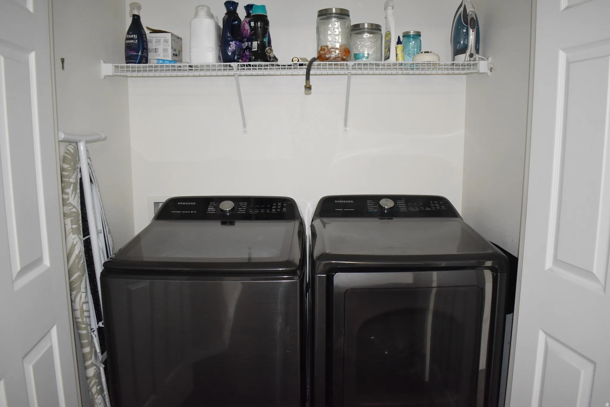 Laundry area featuring separate washer and dryer