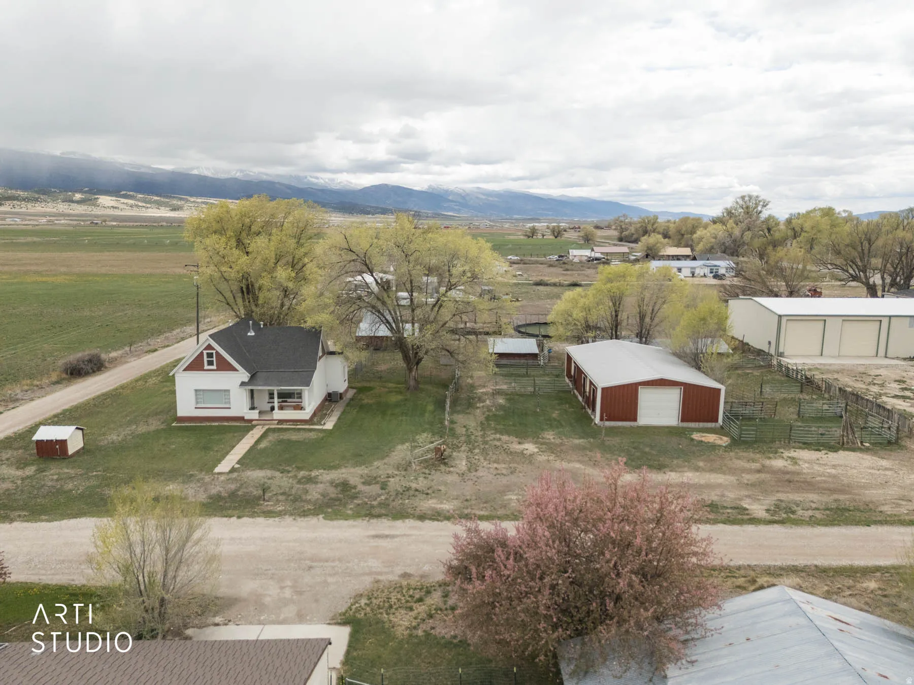 Aerial view of sparsely populated area featuring a mountain backdrop