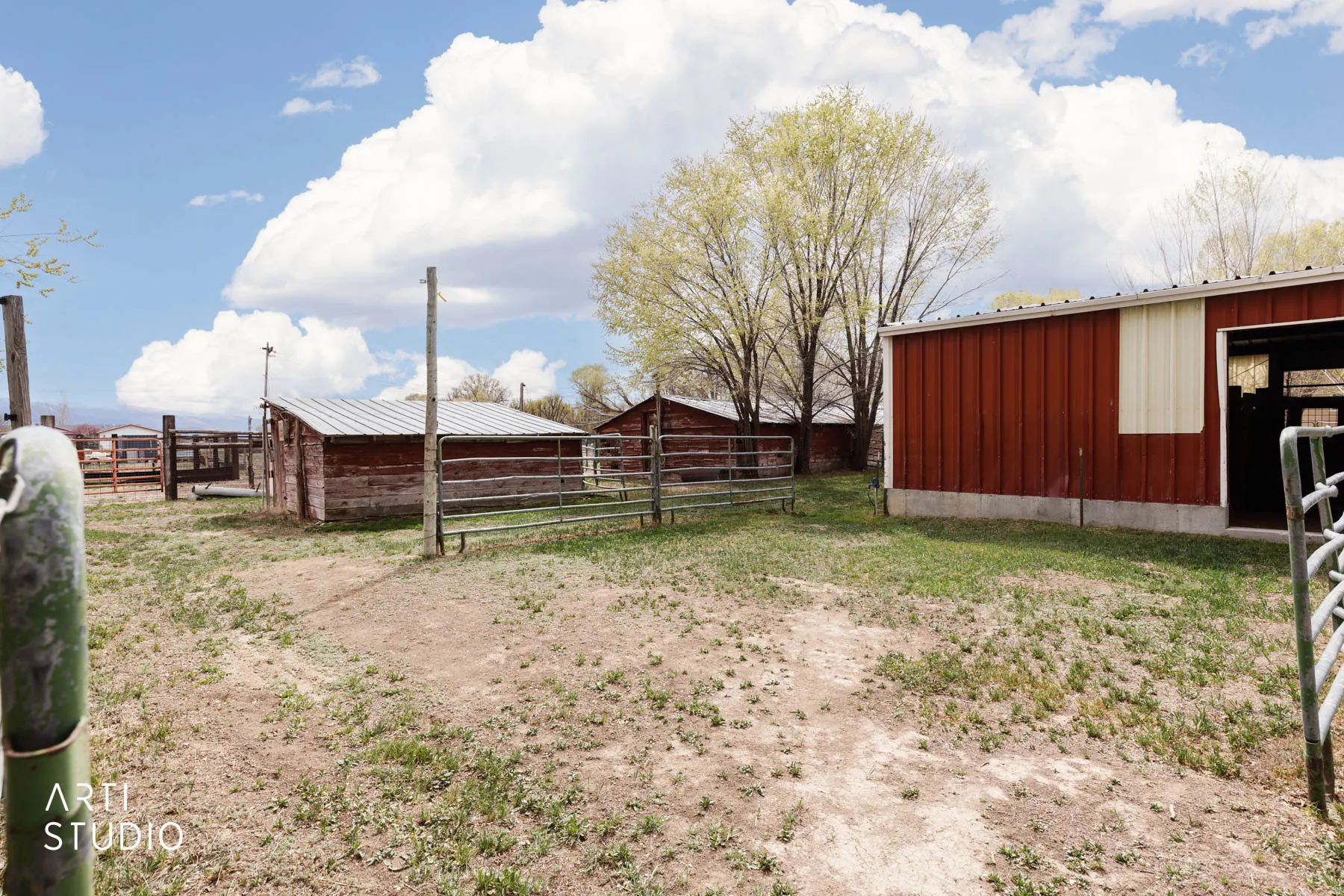 View of yard featuring an outbuilding and an exterior structure