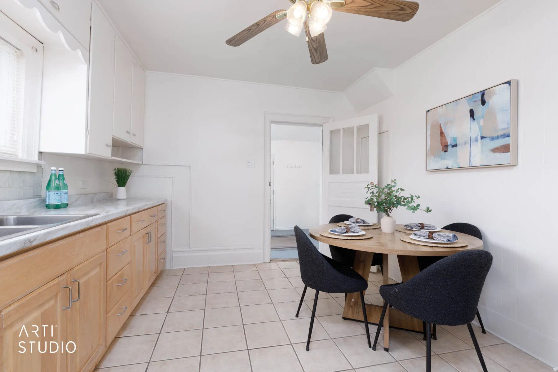 Dining room featuring a ceiling fan and light tile patterned flooring