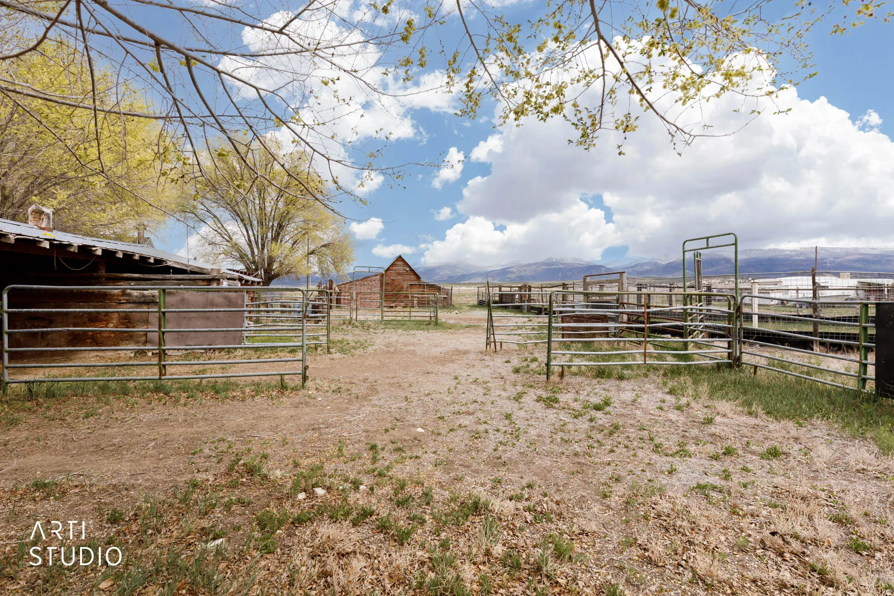 View of yard with an outdoor structure, an exterior structure, a view of countryside, and a mountain view