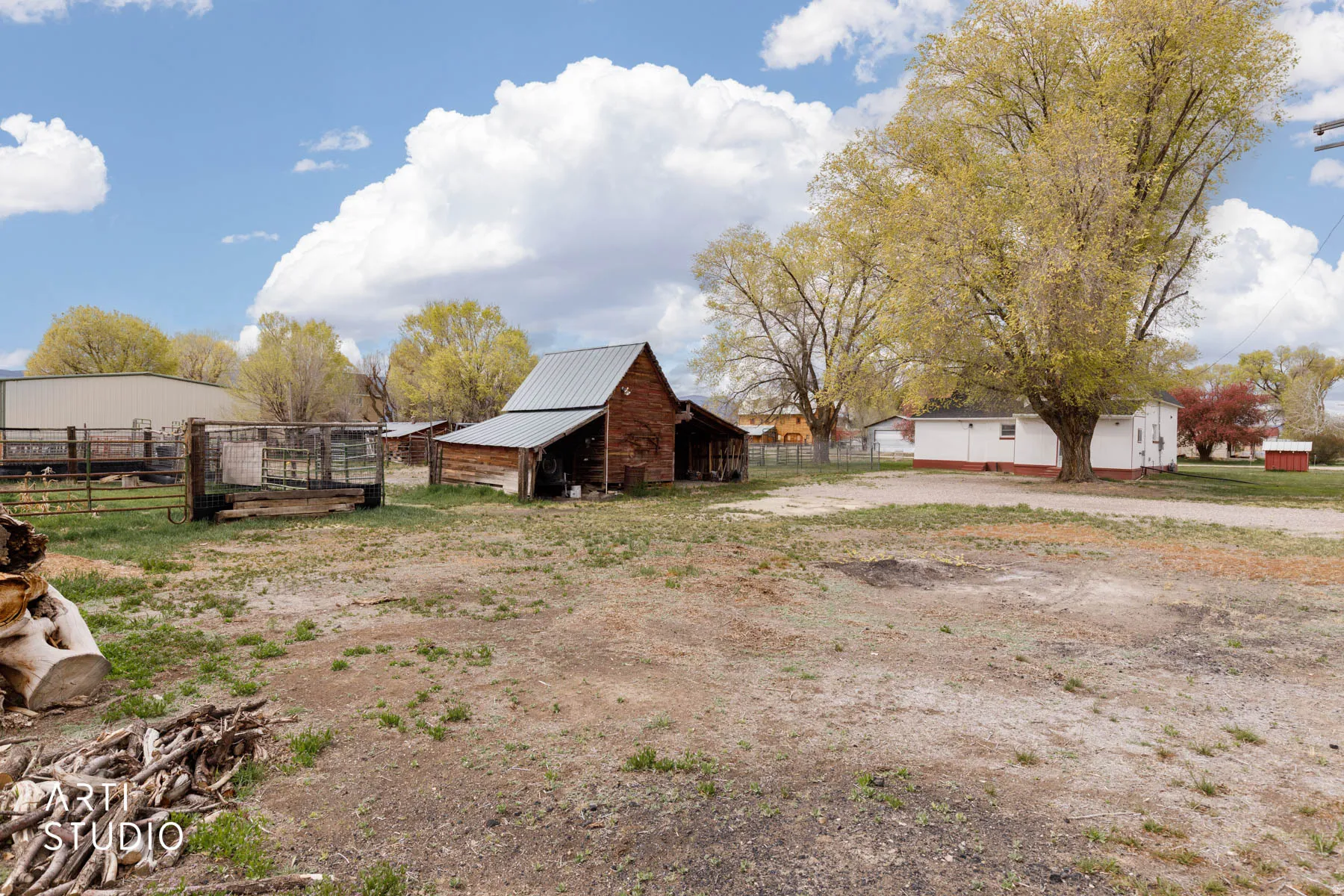 View of yard featuring an outdoor structure and a barn