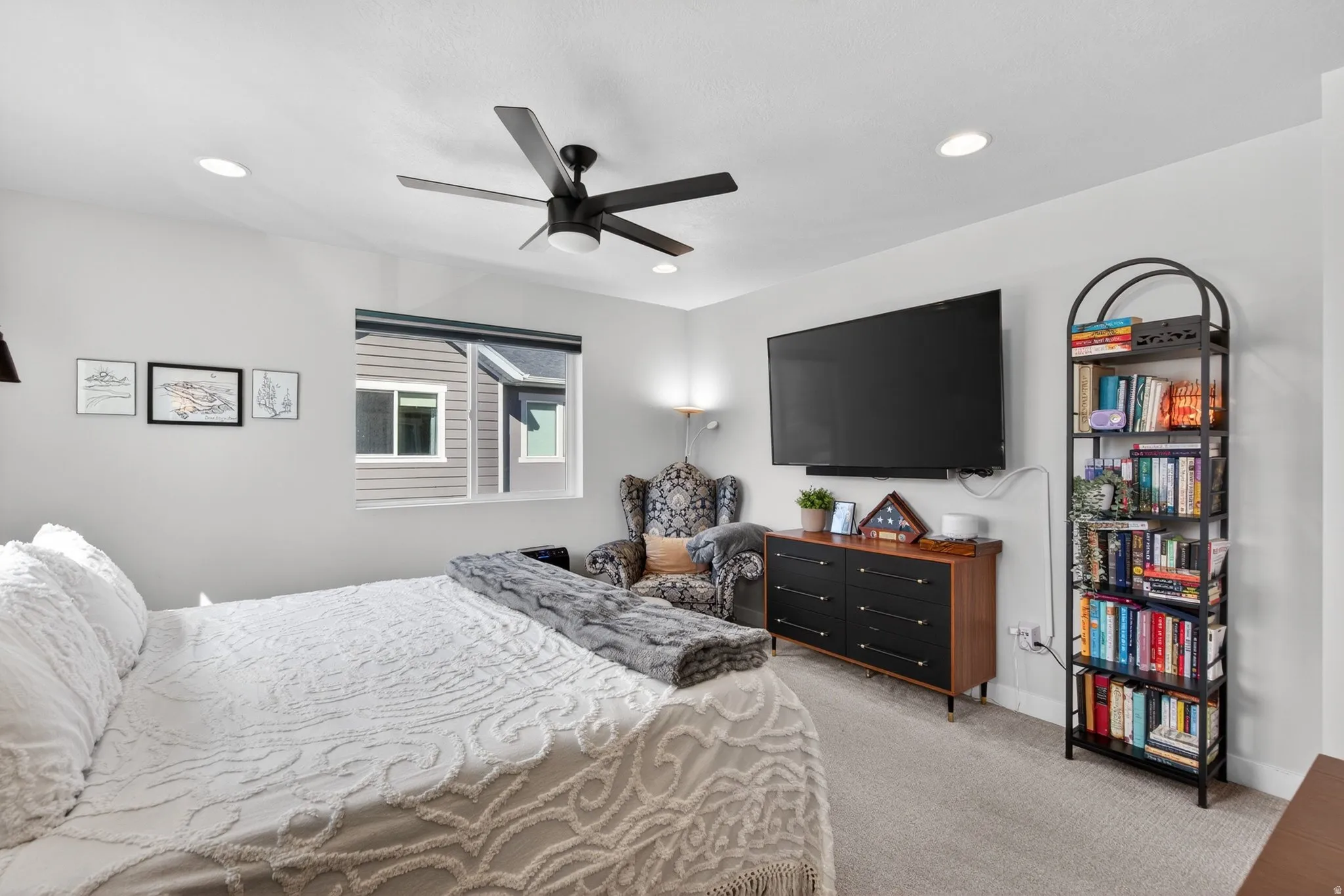 Bedroom featuring light carpet, a ceiling fan, and recessed lighting