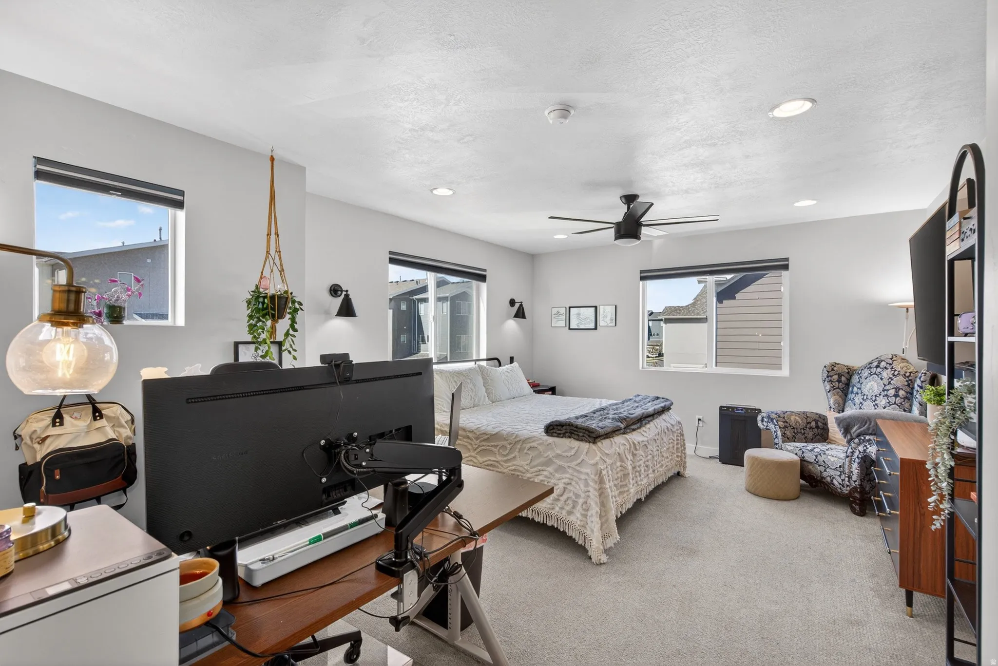 Bedroom featuring carpet floors, ceiling fan, recessed lighting, and a desk