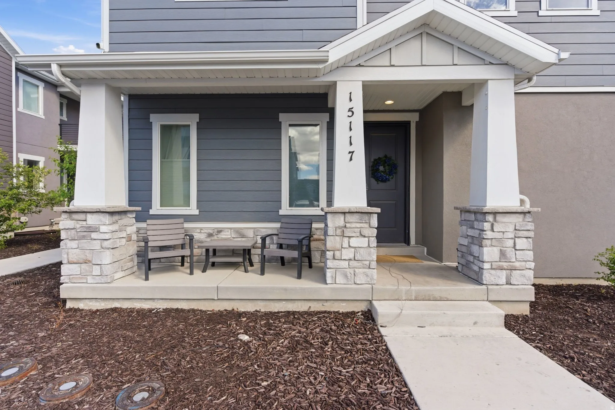 View of exterior entry featuring a porch