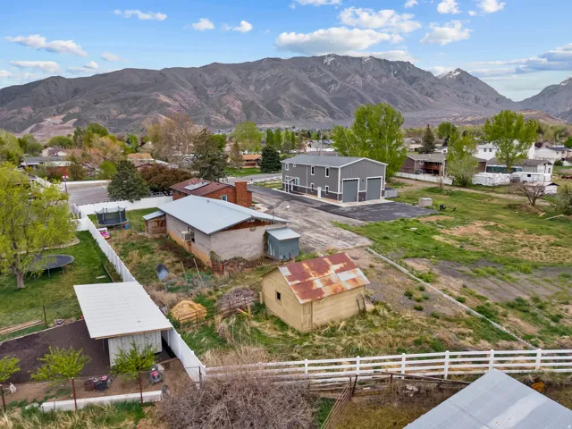 Aerial perspective of suburban area with a mountain backdrop