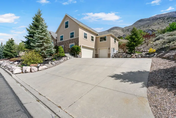 3 car garage with ample driveway parking