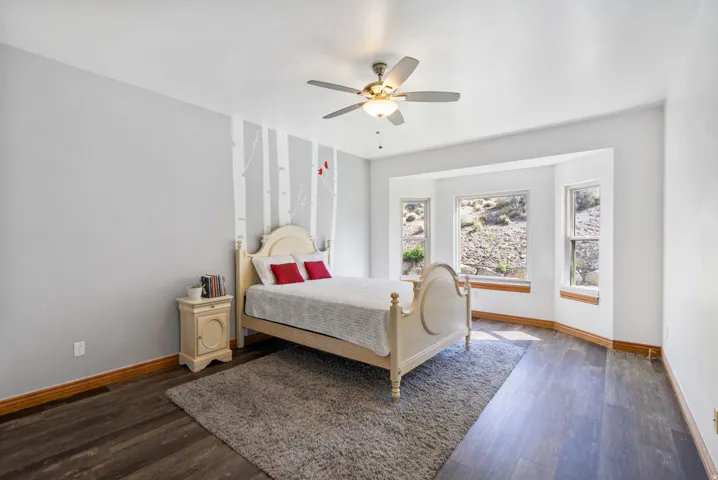 Primary Bedroom with bay window of mountain views