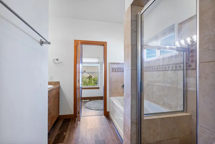 Walk-in shower and large garden tub in Primary Bath