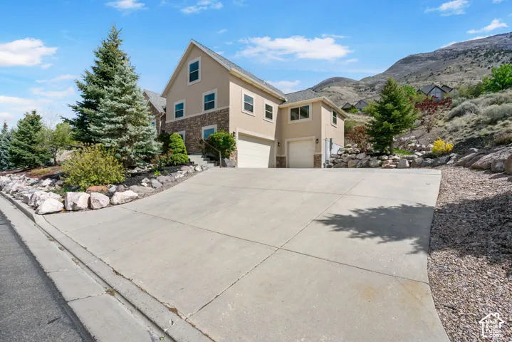 3 car garage with ample driveway parking