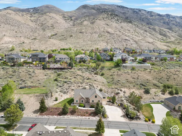 Aerial view of residential area with a mountainous background