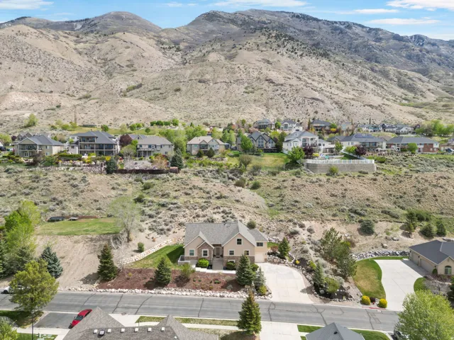 Aerial view of residential area with a mountainous background