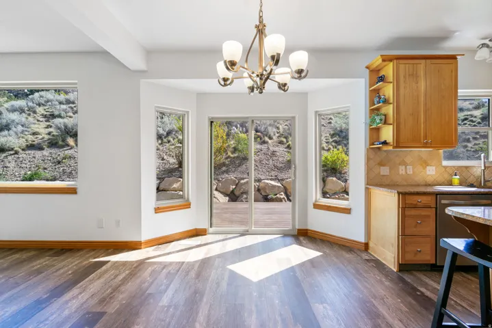 Dining area with bay window and mountain view