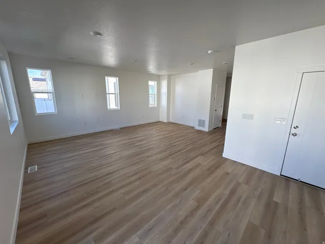 A clear, open dining zone ready for hosting or homework.