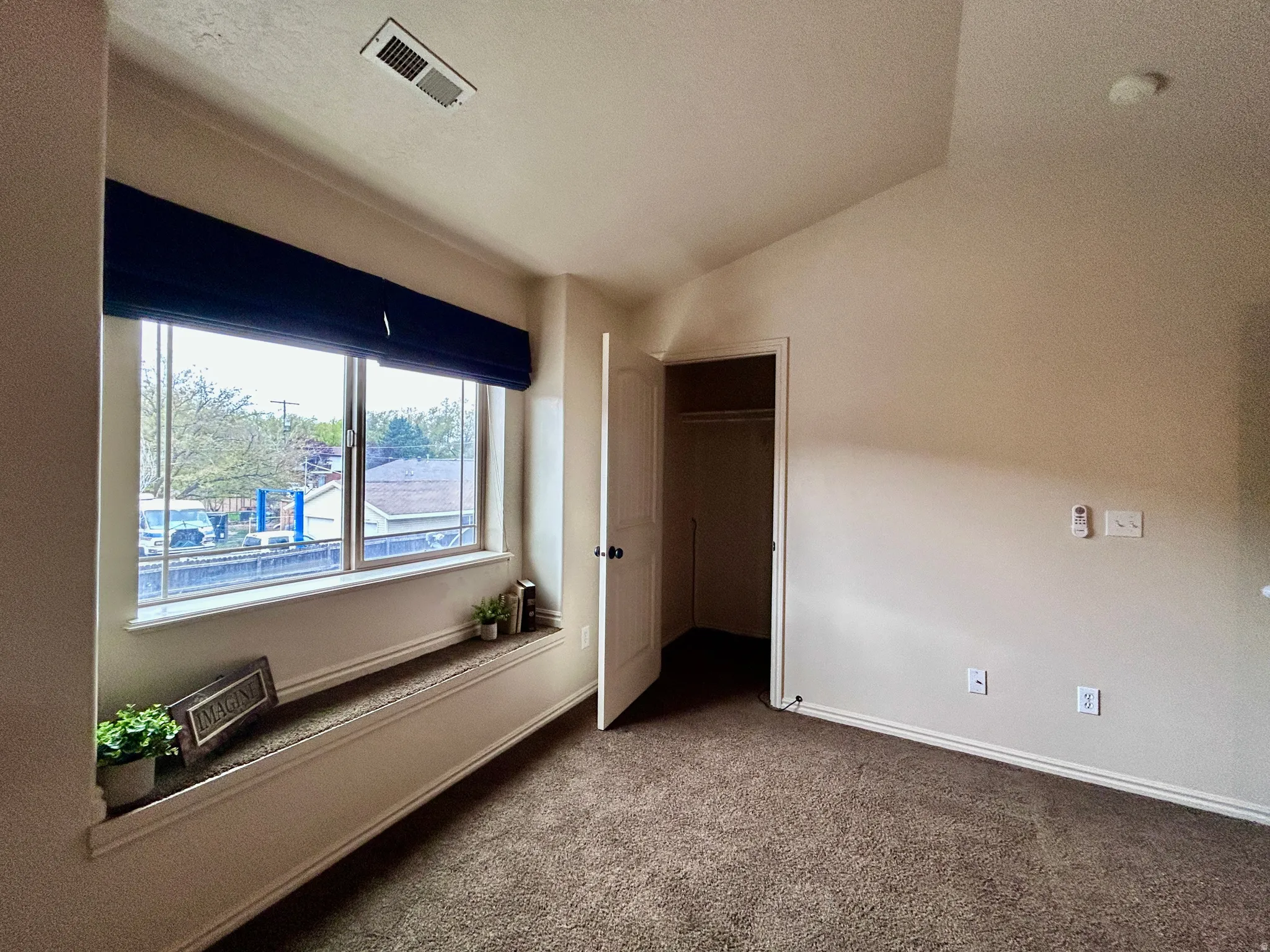 There is a fun window bench in the primary bedroom.