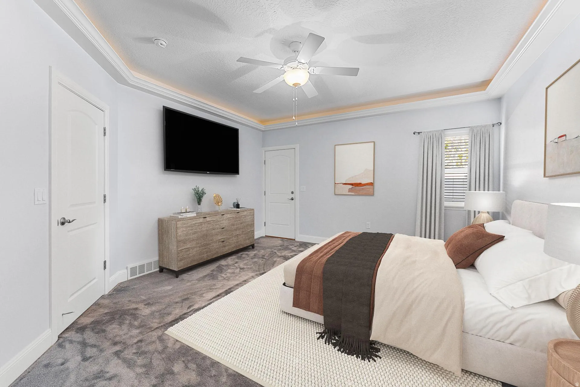Virtually Staged Main Bedroom with ceiling fan, ornamental molding, up lighting and door opens onto private deck