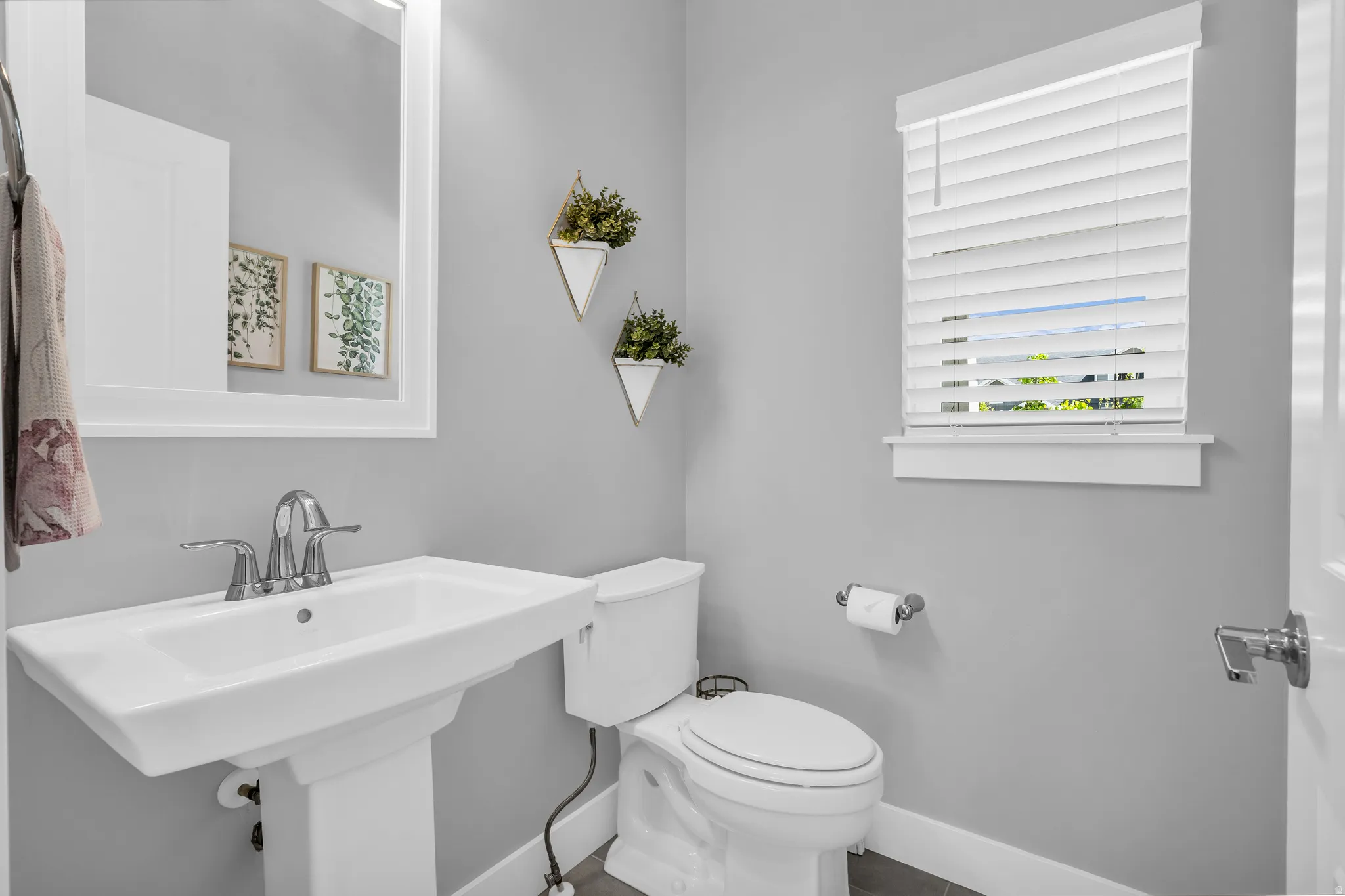 Bathroom featuring toilet and baseboards