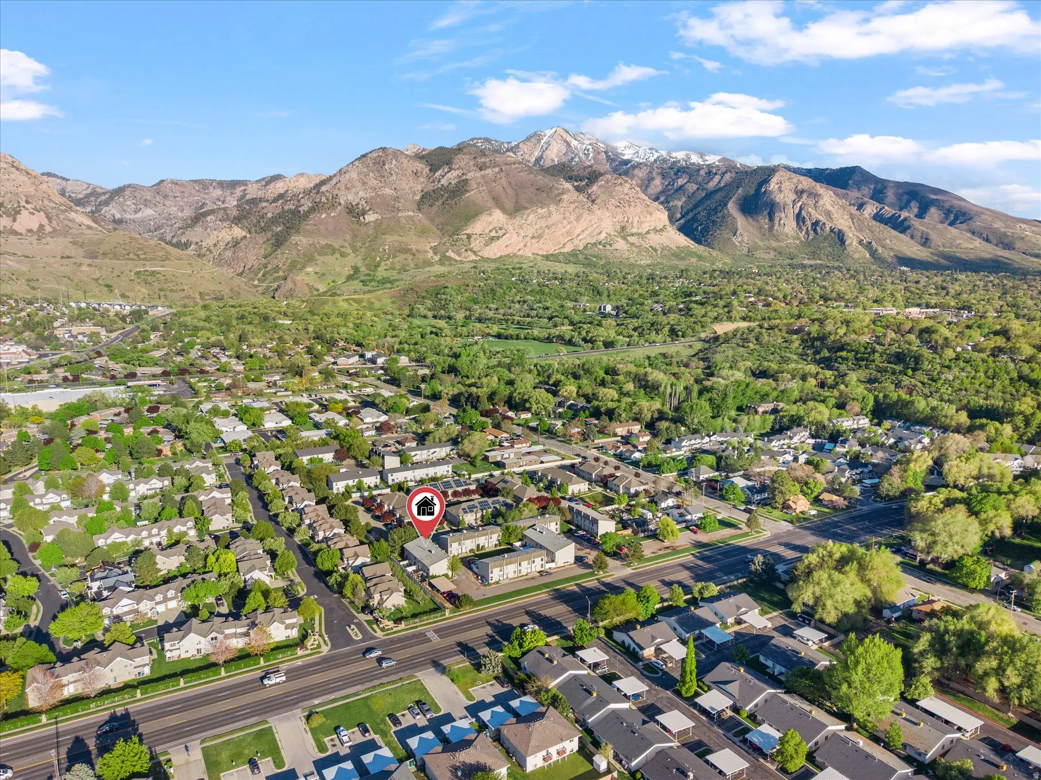 Aerial view of residential area with mountains