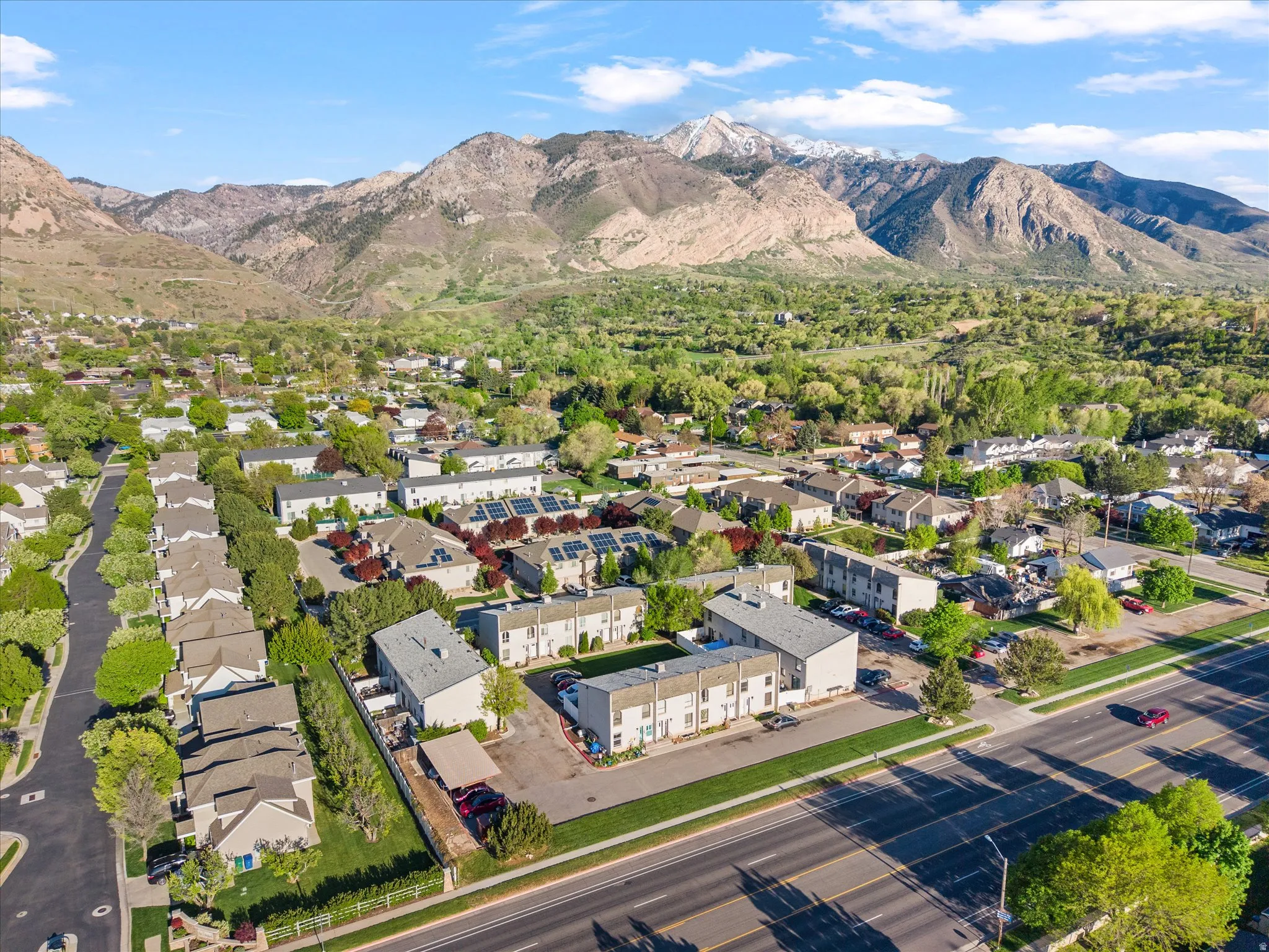 Aerial view of residential area with mountains