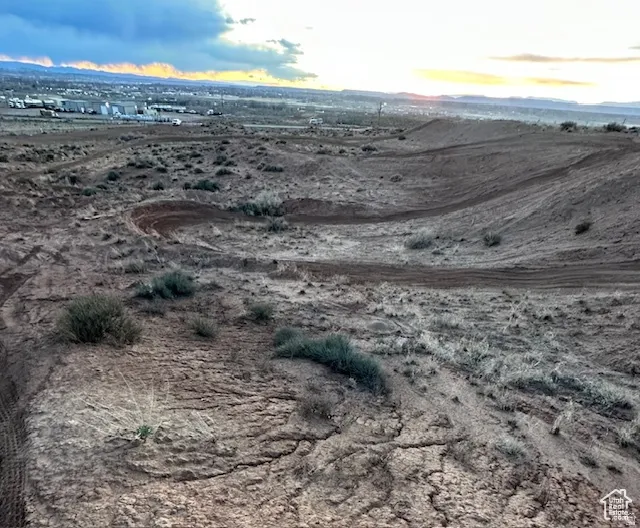 View of mountain backdrop with rural landscape