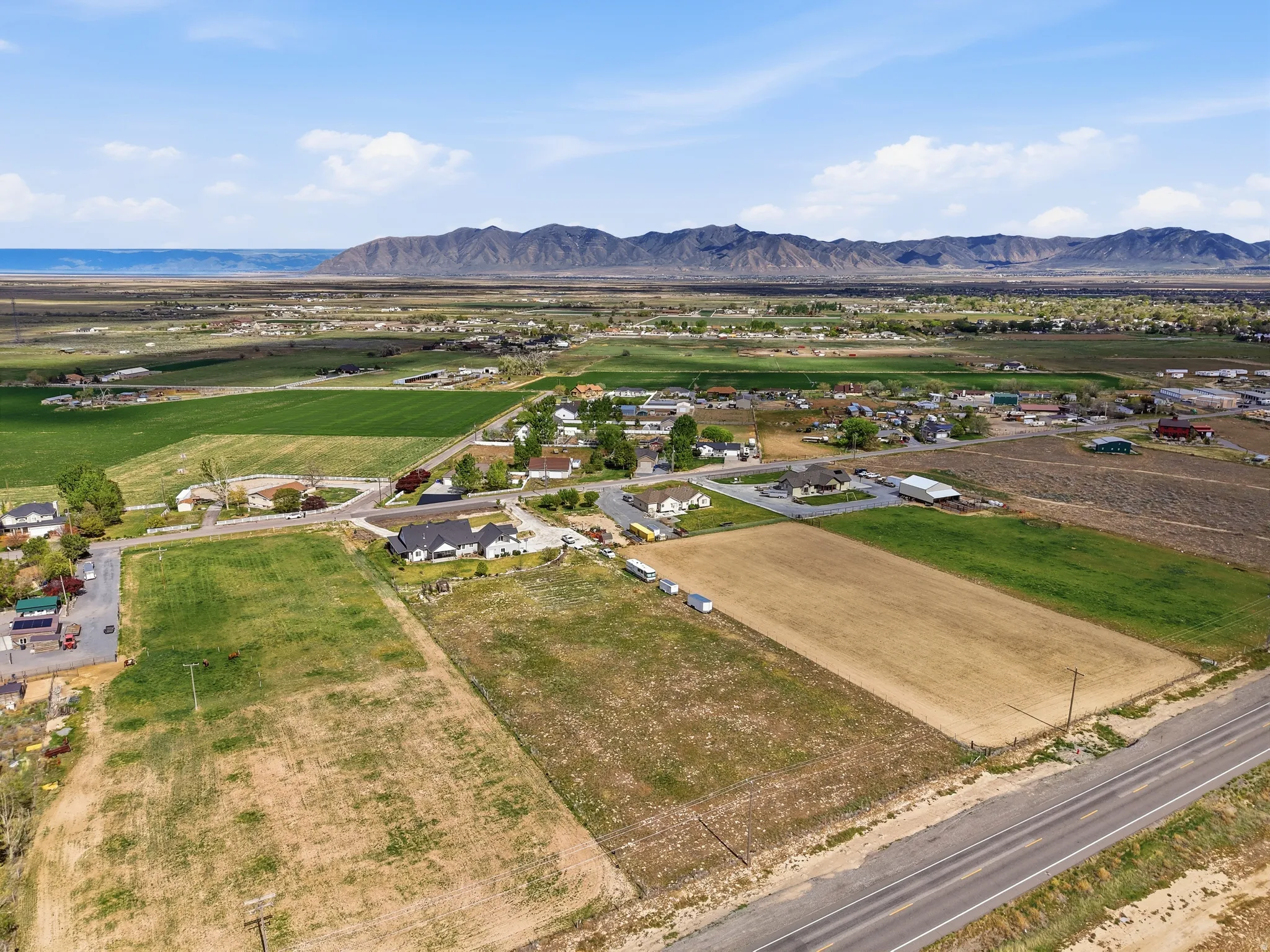 Overview of rural landscape with a mountain backdrop