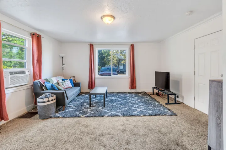 Carpeted living room.