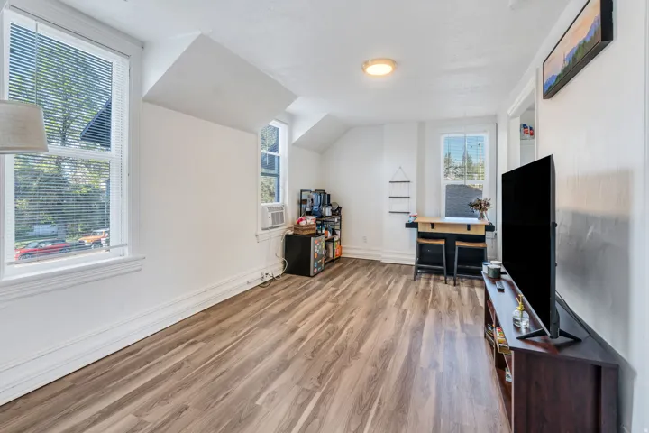 Wood finished floors, lofted ceiling.