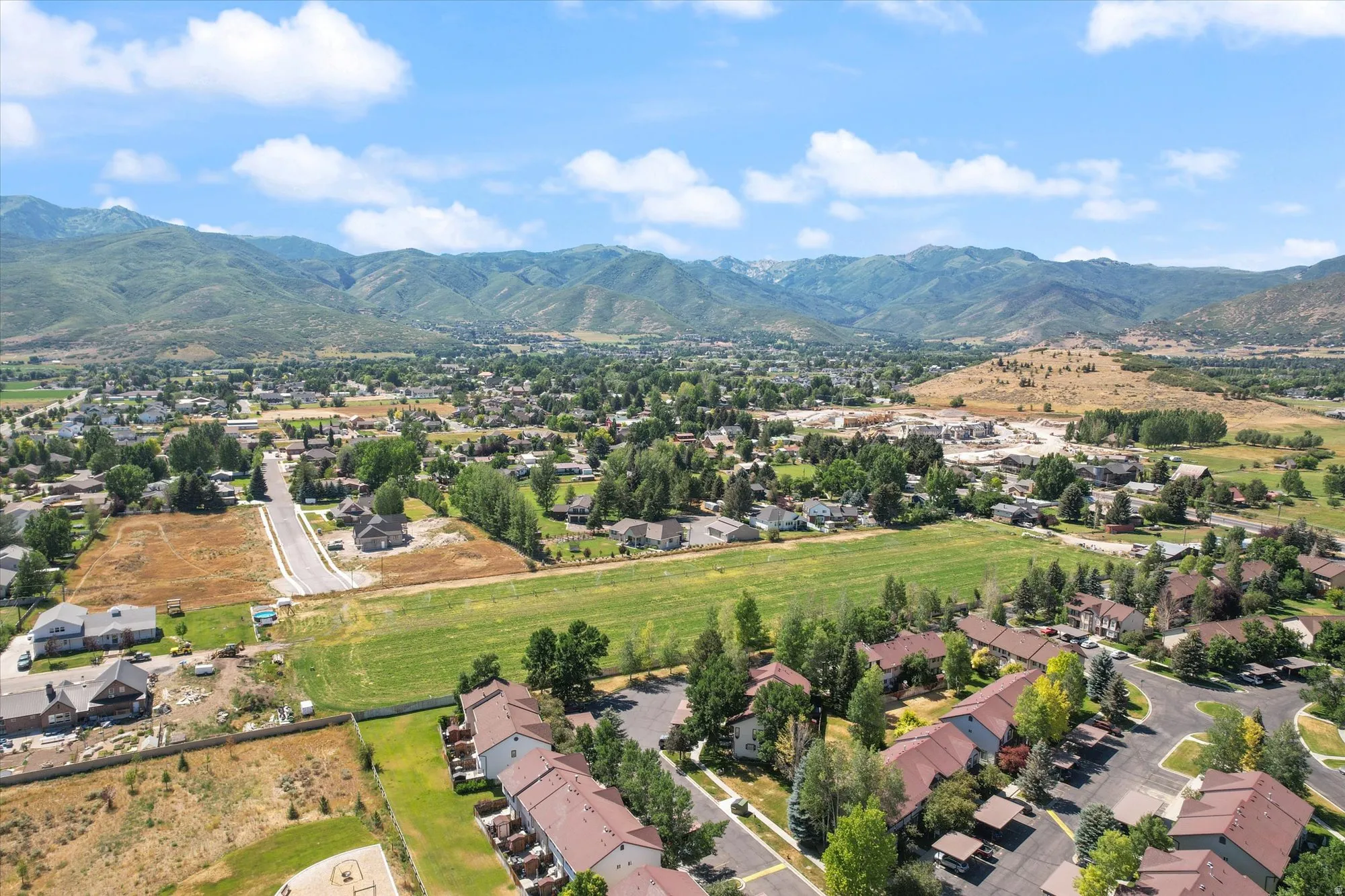 Aerial view of residential area with mountains