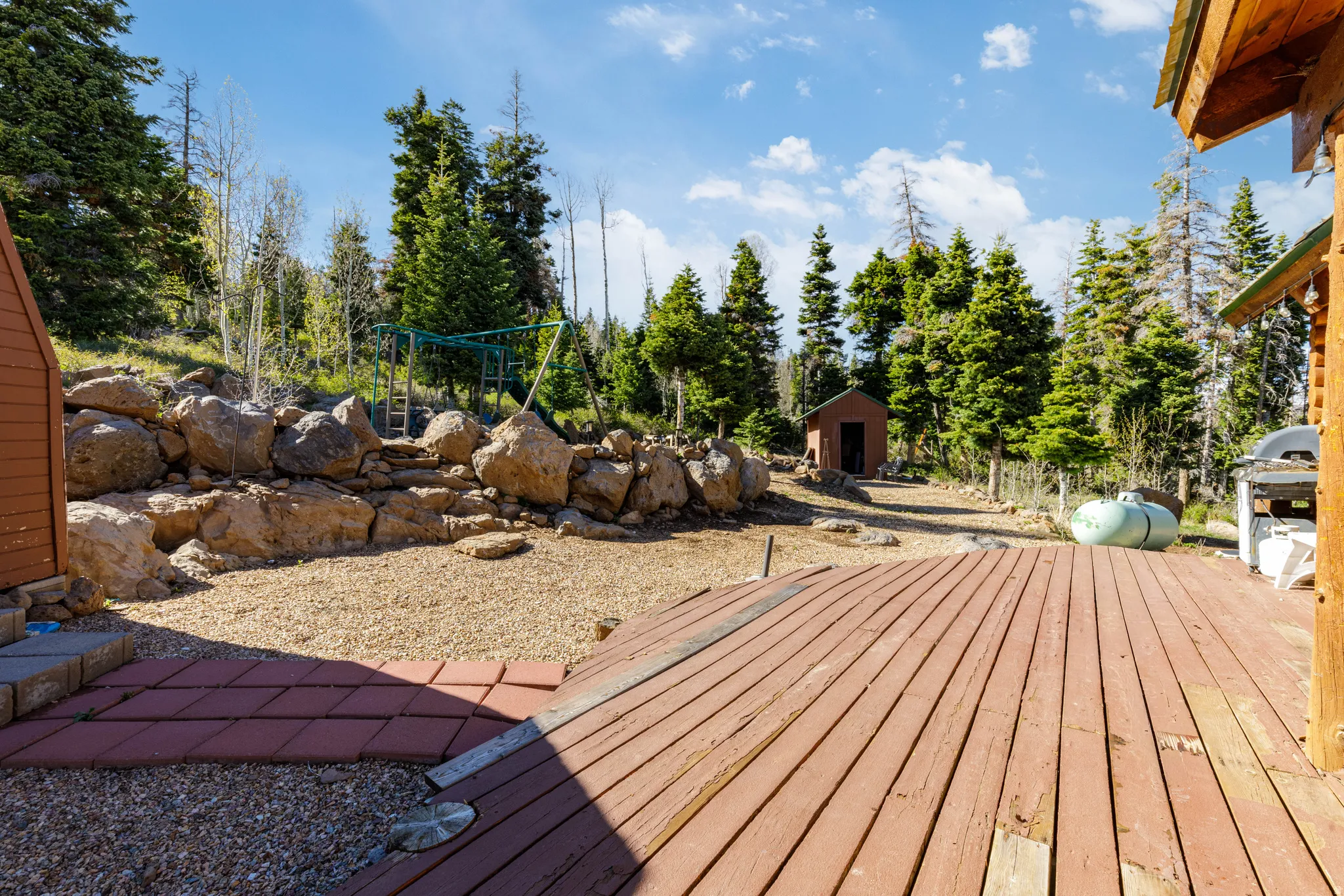Leveled Deck Space: Plenty of room for outdoor furniture and enjoying the peaceful surroundings.